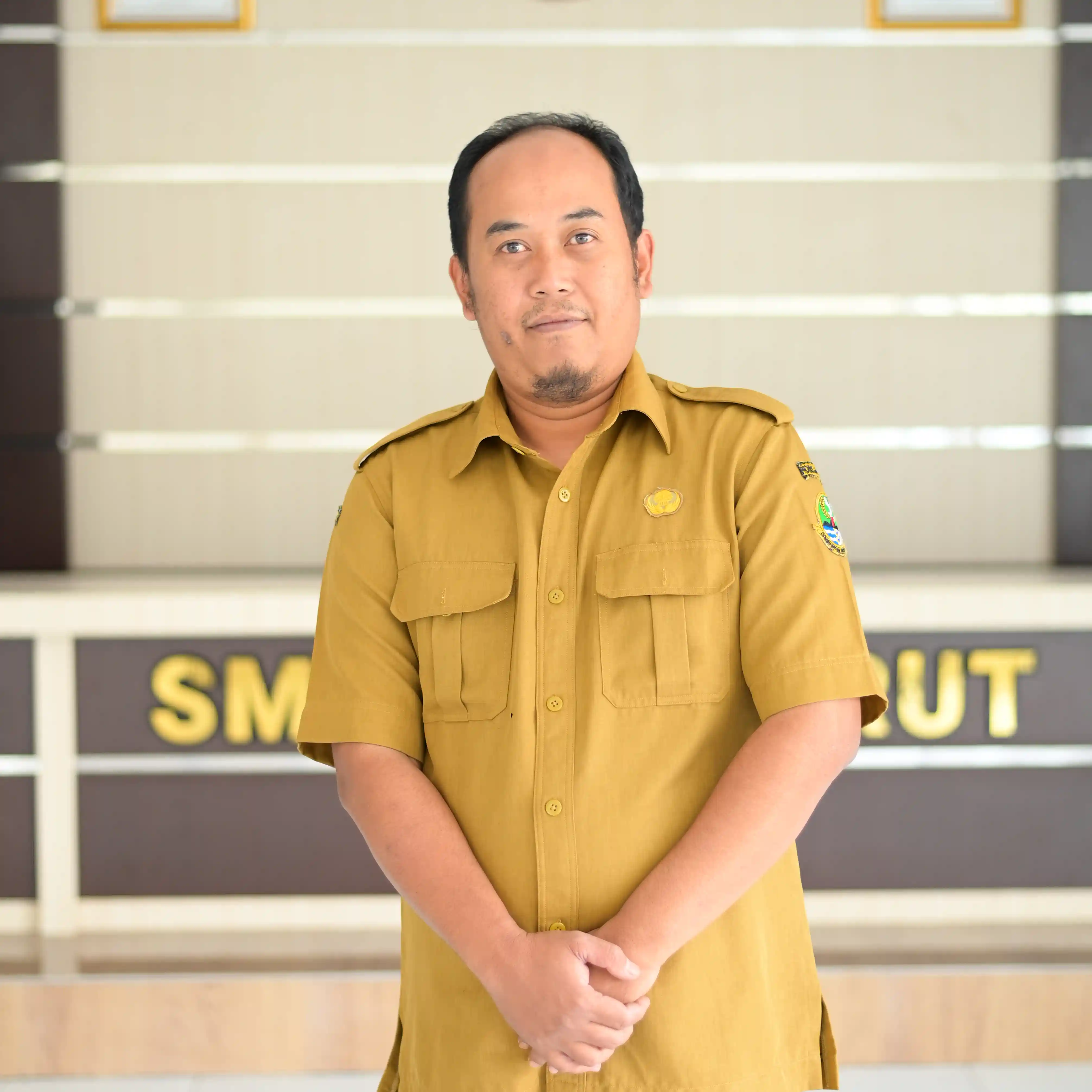 Hikmat Arif, S.Pd, M.Pd.
