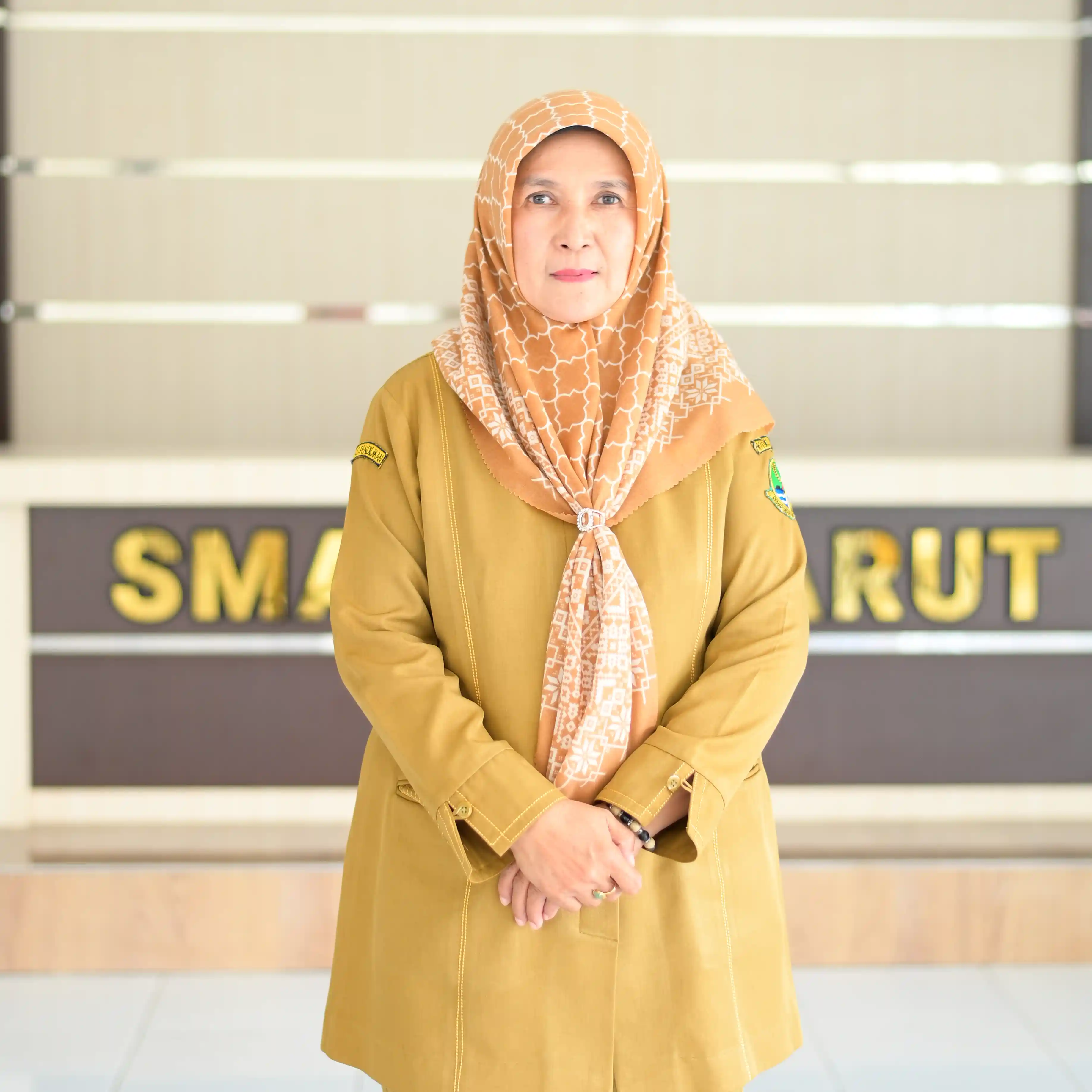Kukun Djuangsih, S.Pd.
