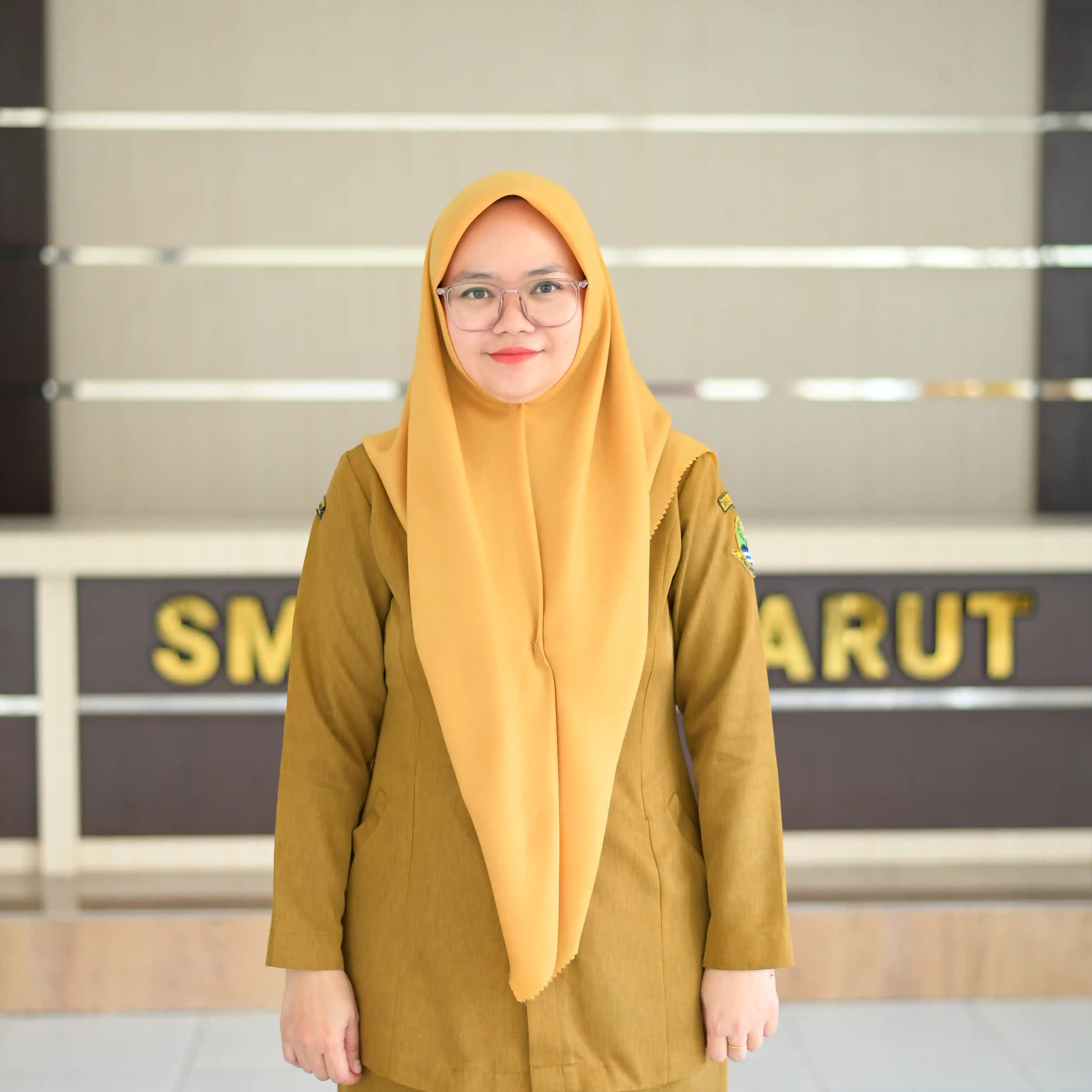 Elis Farida, S.IP